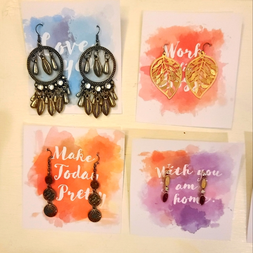 Lot of 10 pairs of bronze or gold colored earrings.